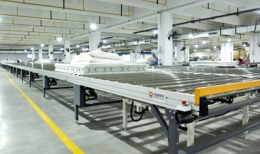 床垫生产线为什么要用巨林智能滚筒输送线